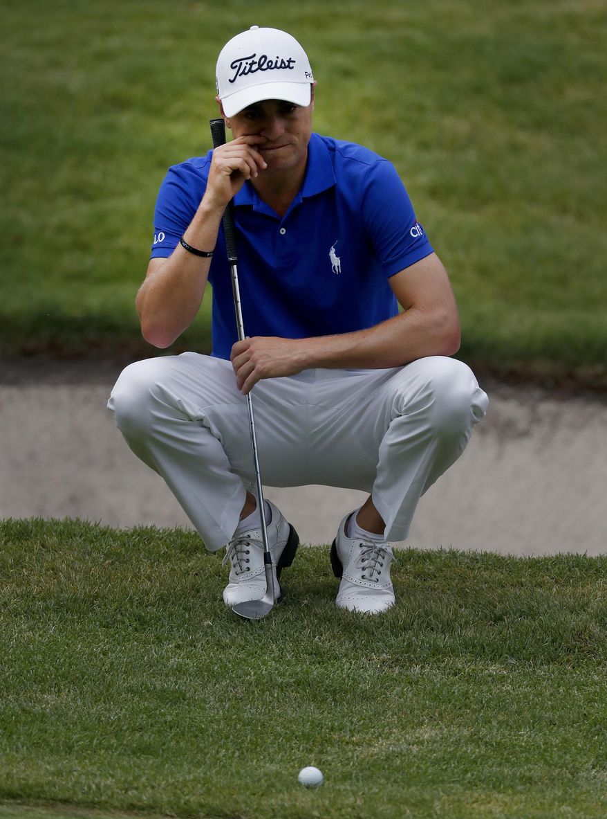 Justin Thomas, of the U.S., prepares to putt on the 6th hole in round three of the Mexico Championship at Chapultepec Golf Club in Mexico City, Saturday, March 4, 2017. All but one of the world's top 50 golfers are contesting the World Golf Championship PGA event, which this year relocated to Mexico City from the Trump National Doral Resort in Florida. (AP Photo/Eduardo Verdugo)