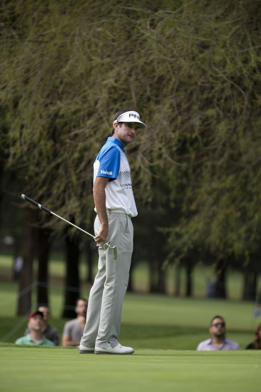 Bubba Watson, of the U.S. scans the 13th hole green in round two of the Mexico Championship at Chapultepec Golf Club in Mexico City, Friday, March 3, 2017. All but one of the world's top 50 golfers are contesting the World Golf Championship PGA event, which this year relocated to Mexico City from the Trump National Doral Resort in Florida. (AP Photo/Eduardo Verdugo)