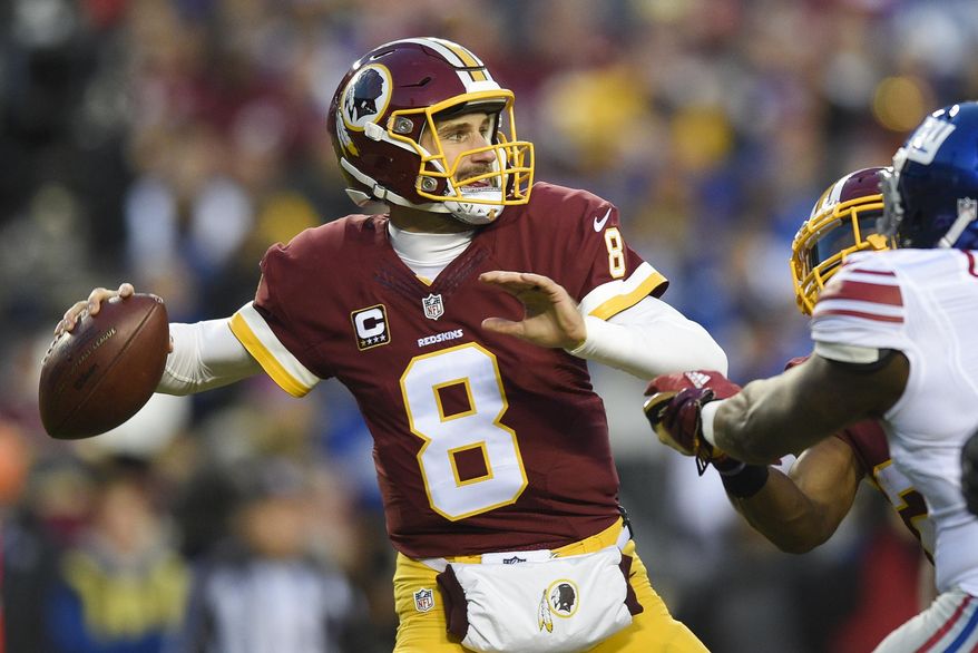 In this Jan. 1, 2017, file photo, Washington Redskins quarterback Kirk Cousins (8) passes during the first half of an NFL football game against the New York Giants in Landover, Md. In a move that seemed the most likely at this point in the odd dance between Kirk Cousins and the Washington Redskins, the team placed the exclusive franchise tag on the starting quarterback on Tuesday. (AP Photo/Nick Wass, File)