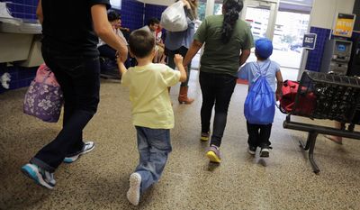 Adults who cross into the U.S. illegally could be detained and separated from their children under a Homeland Security proposal. (Associated Press)