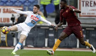 Napoli&#39;s Dries Mertens, left, kicks the ball past Roma&#39;s Antonio Rudiger during a Serie A soccer match between Roma and Napoli, at the Rome Olympic stadium, Saturday, March 4, 2017. (AP Photo/Gregorio Borgia)