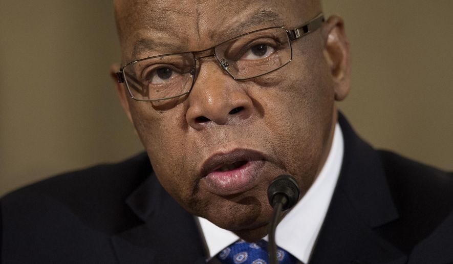 FILE - In this Jan. 11, 2017, file photo, Rep. John Lewis, D-Ga. testifies on Capitol Hill in Washington. Dante Antoine Rosser accused of threatening the staff of Lewis is set to appear in court Monday, March 6, 2017, in Atlanta for a hearing to decide whether he'll continue to be held in custody. (AP Photo/Cliff Owen, File)