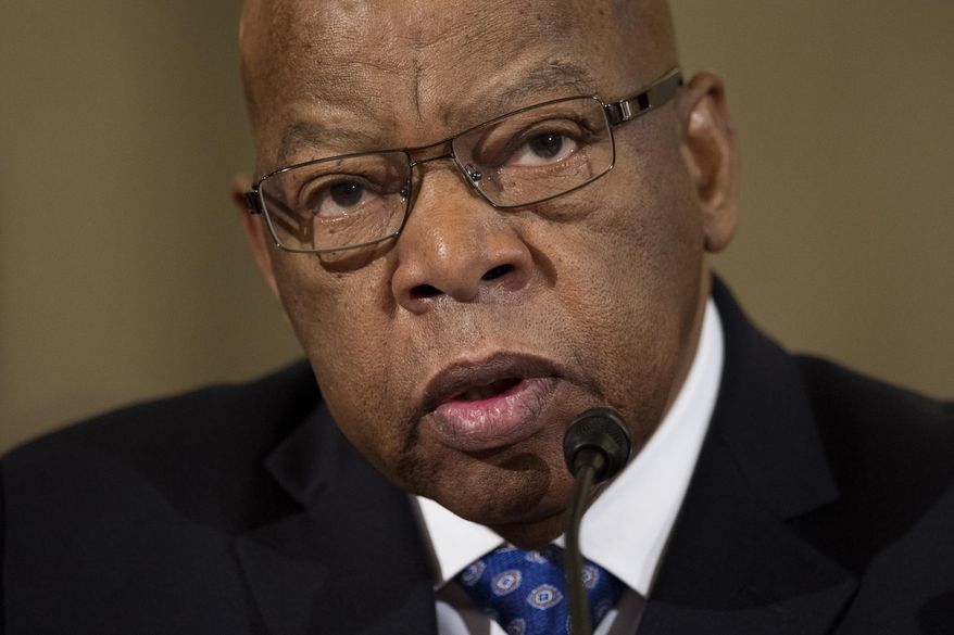 FILE - In this Jan. 11, 2017, file photo, Rep. John Lewis, D-Ga. testifies on Capitol Hill in Washington. Dante Antoine Rosser accused of threatening the staff of Lewis is set to appear in court Monday, March 6, 2017, in Atlanta for a hearing to decide whether he'll continue to be held in custody. (AP Photo/Cliff Owen, File)