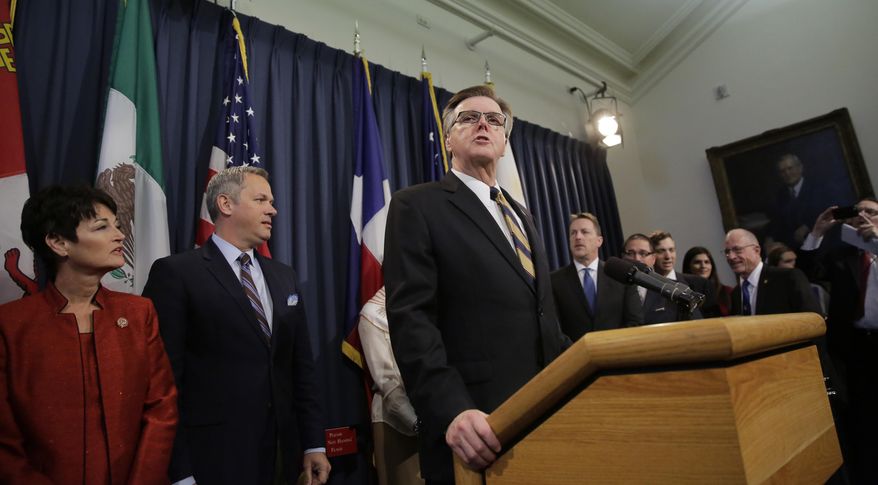 Texas Lt. Gov. Dan Patrick, center, with other legislators and supporters of Senate Bill 6, talks to the media at the Texas Capitol, Monday, March 6, 2017, in Austin, Texas. The "bathroom bill" would require people to use public bathrooms and restrooms that correspond with the sex on their birth certificate. (AP Photo/Eric Gay)