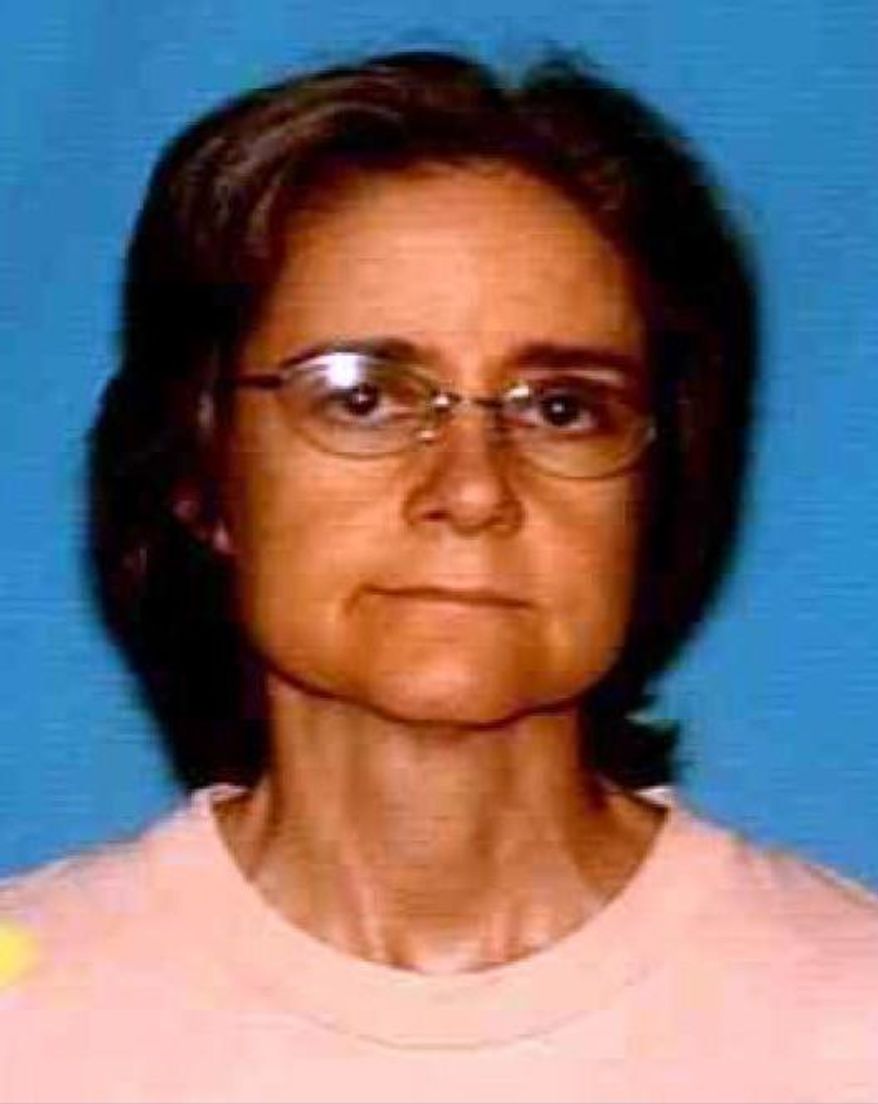An undated photo provided by the Houston Police Department Missing Persons Unit shows Mary Cerruti. The new owners of a Houston bungalow have discovered human remains in an attic wall that may belong to Cerruti, the previous owner, who went missing at least two years ago. The residents were moving into the home Saturday, March 4, 2017, when they found a gap in the wall and discovered bones. Cerruti had last been seen in the spring of 2015. (Houston Police Department/Houston Chronicle via AP)