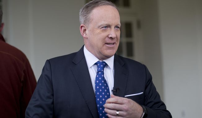 White House Press secretary Sean Spicer walks out of the West Wing of the White House in Washington to speak with members of the media, Monday, March 6, 2017. (AP Photo/Pablo Martinez Monsivais)
