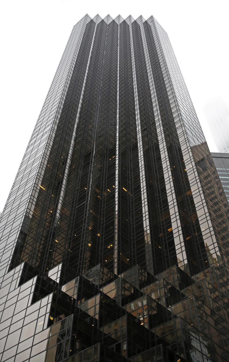 FILE - This Nov. 15, 2016, file photo, shows Trump Tower in New York. An apartment in the luxury Trump Tower in Manhattan got rave reviews on the home rental website Airbnb. The New York Times says the listing was removed after it contacted Airbnb for comment about the rental in the building that's home to President Donald Trump and his family. (AP Photo/Kathy Willens, File)