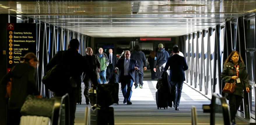 Airport officials and civil rights lawyers across the U.S. are getting ready to face President Trump&#x27;s latest travel ban, which no longer affects Iraqi visitors. (Associated Press)