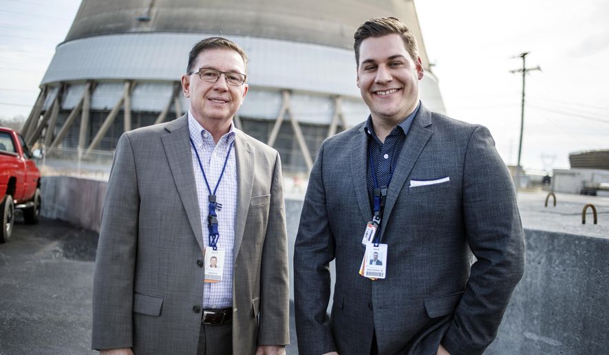 FOR RELEASE SATURDAY, MARCH 11, 2017, AT 3:01 A.M. EST.- This photo taken Feb. 28, 2017, shows Exelon Corporation Three Mile Island nuclear generating station spokesman Ralph DeSantis, left,who is retiring after 38 years on the job. With him is new TMI spokesman Dave Marcheskie. DeSantis has been with TMI since the 1979 partial meltdown of the Unit 2 reactor. It's been 38 years now, but the long legacy of the March 1979 partial meltdown at the Three Mile Island nuclear power plant lingers to this day. (Dan Gleiter /PennLive.com via AP)