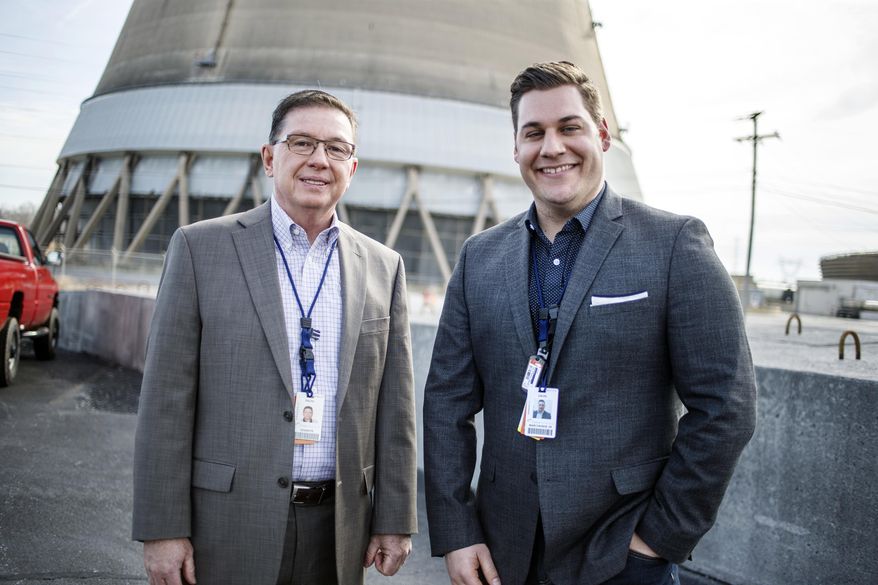 FOR RELEASE SATURDAY, MARCH 11, 2017, AT 3:01 A.M. EST.- This photo taken Feb. 28, 2017, shows Exelon Corporation Three Mile Island nuclear generating station spokesman Ralph DeSantis, left,who is retiring after 38 years on the job. With him is new TMI spokesman Dave Marcheskie. DeSantis has been with TMI since the 1979 partial meltdown of the Unit 2 reactor. It's been 38 years now, but the long legacy of the March 1979 partial meltdown at the Three Mile Island nuclear power plant lingers to this day. (Dan Gleiter /PennLive.com via AP)