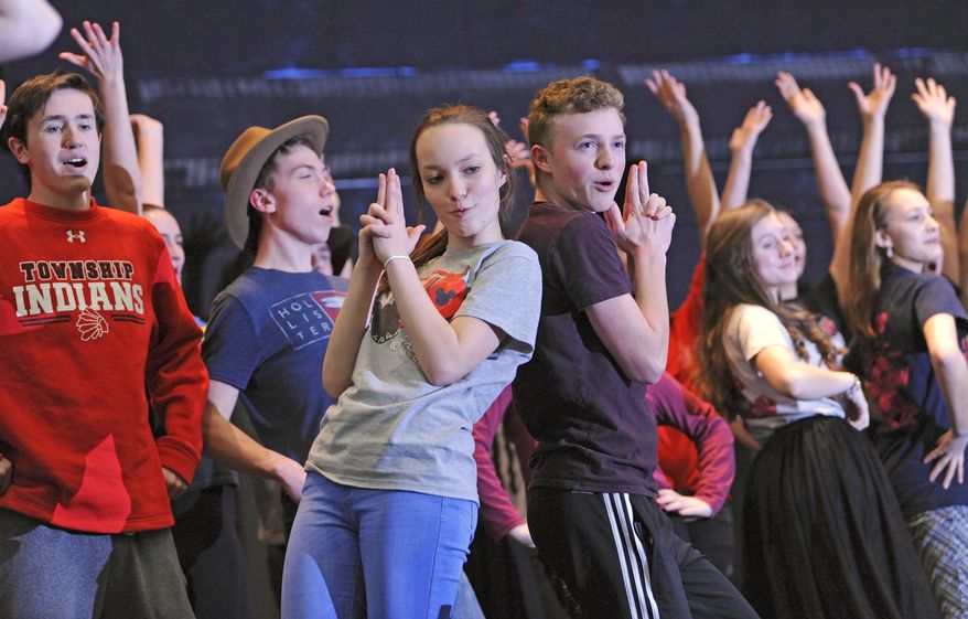 ADVANCE FOR USE SATURDAY, MARCH 11, 2017, AND THEREAFTER – Students participate in a rehearsal of the musical "Annie Get Your Gun" on March 2, 2017, at Conemaugh Township Area High School in Davidsville, Pa. Some high school musicals welcome middle-school performers, possibly motivating students to continue participating throughout high school, according to Conemaugh Township's drama and music teacher Mari Grace Lingenfelter, who is directing the school's musical. "And if we don't get them by this age, we might lose them," she said. (John Rucosky/The Tribune-Democrat via AP)