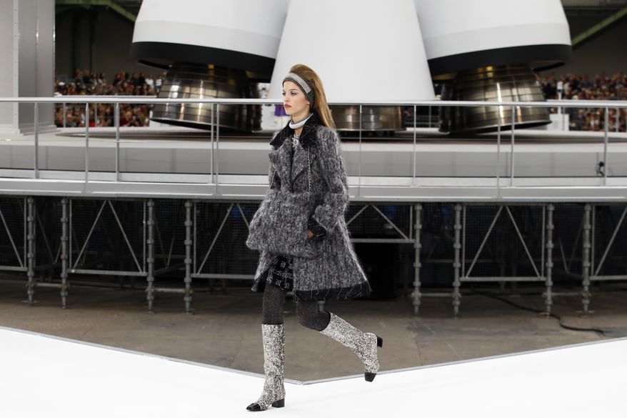 A model wears a creation for Chanel's Fall-Winter 2017/2018 ready-to-wear fashion collection presented Tuesday, March 7, 2017 in Paris. (AP Photo/Francois Mori)