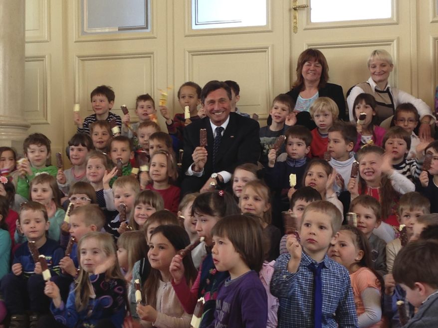 In this photo provided by the Office of the Slovenia&#x27;s president and used on president&#x27;s Instagram, Slovenia&#x27;s president Borut Pahor, centre, shares a laugh while enjoying ice cream with a group of children at the presidential palace in Ljubljana, Slovenia, April 2, 2015. Donald Trump may rule Twitter, but he&#x27;s no match for his Slovenian counterpart on Instagram as Slovenia&#x27;s president Borut Pahor has been actively using social media to get his message across since 2012. (Petra Arsic/Office of the Slovenia&#x27;s President via AP)