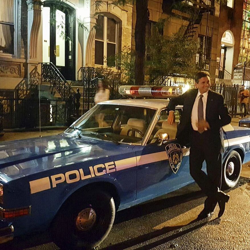 In this Sept. 29, 2016 photo provided by the Office of the Slovenia&#x27;s president and used on president&#x27;s Instagram, Slovenia&#x27;s president Borut Pahor poses with a police car in New York City. Donald Trump may rule Twitter, but he&#x27;s no match for his Slovenian counterpart on Instagram as Slovenia&#x27;s president Borut Pahor has been actively using social media to get his message across since 2012. (Klemen Horvat/Office of the Slovenia&#x27;s President via AP)