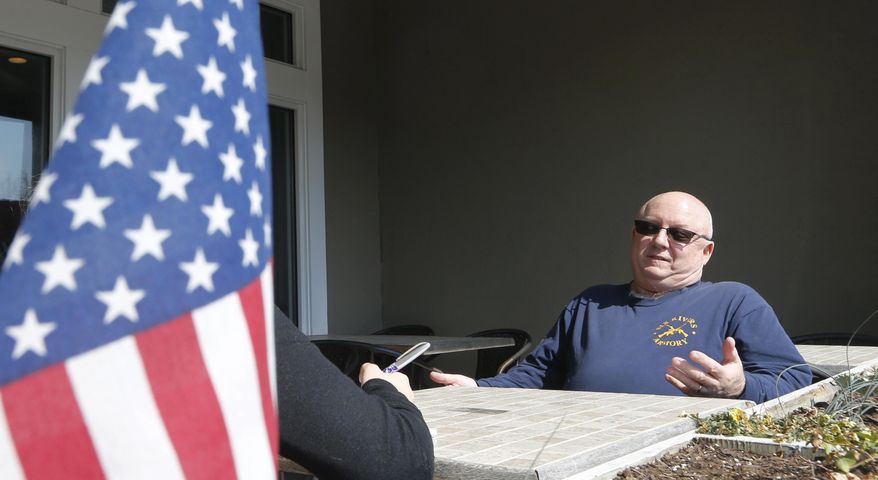 Gloucester resident Andrew Snyder gestures during an interview in Gloucester, Va., Monday, March 6, 2017. Snyder, a 57-year-old Coast Guard retiree whose son attends the same high school as transgender student Gavin Grimm, said Monday that he thought the district had "more than accommodated Gavin." But said he didn't want to see Grimm ostracized. (AP Photo/Steve Helber)