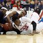 Penn State guard Tony Carr, back center, attempts to hold onto the loose ball as Nebraska center Jordy Tshimanga (32) reaches for it, during the first half of an NCAA college basketball game in the Big Ten Conference tournament, Wednesday, March 8, 2017, in Washington. (AP Photo/Alex Brandon)