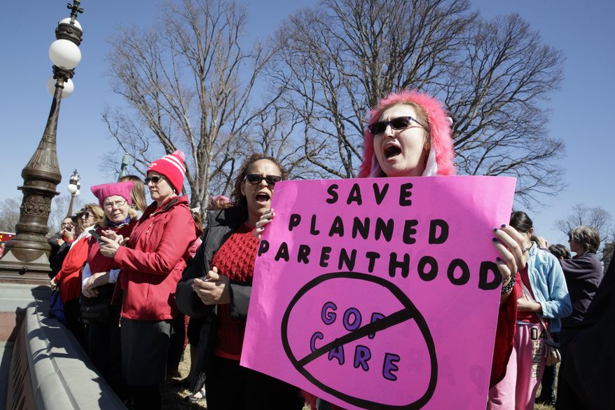 Women activists voice their objections as House Republicans work on their long-awaited plan to repeal and replace the Affordable Care Act, Wednesday, March 8, 2017, on Capitol Hill in Washington. (AP Photo/J. Scott Applewhite)