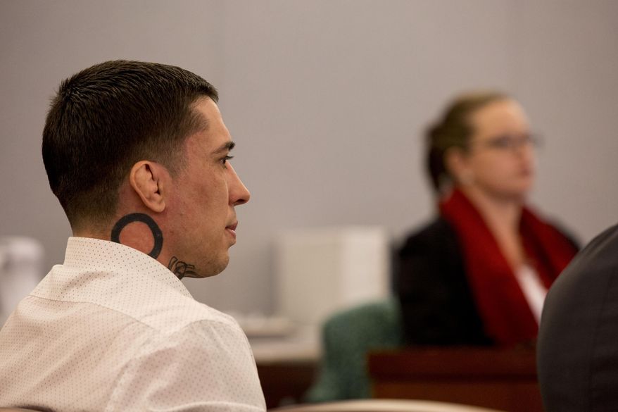 Former mixed martial arts fighter War Machine, also known as Jonathan Koppenhaver, listens to the testimony from victim and ex-girlfriend Christine Mackinday during his sexual assault and attempted murder trial at the Regional Justice Center, Wednesday, March 8, 2017, Las Vegas. Koppenhaver has pleaded not guilty to all 34 felony charges against him, including kidnapping, attempted murder and multiple counts of sexual assault that could get him life in prison without parole if he's found guilty. (Elizabeth Brumley/Las Vegas Review-Journal via AP)