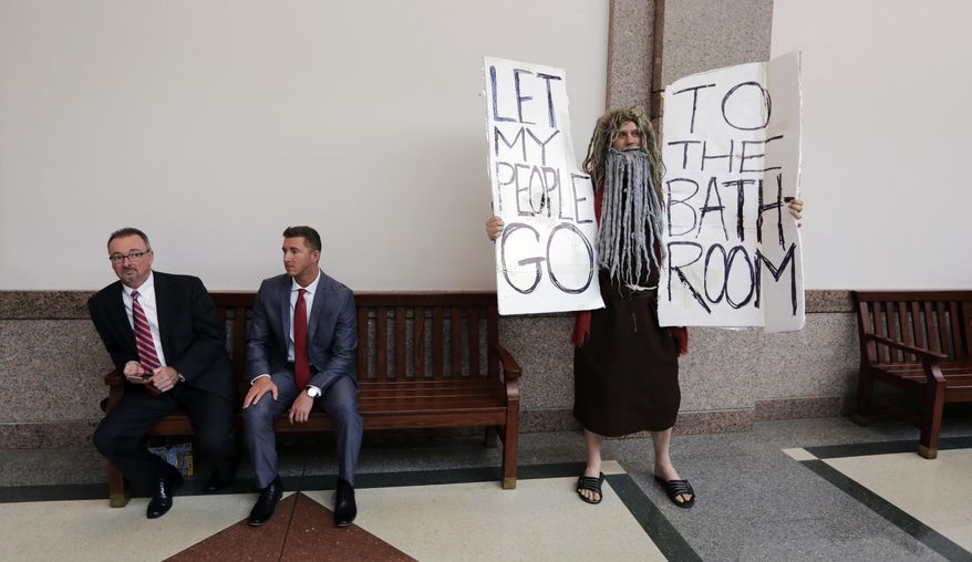 John Erler protests as the Senate State Affairs Committee begin hearings about Senate Bill 6 at the Texas Capitol, Tuesday, March 7, 2017, in Austin, Texas. The the transgender "bathroom bill" would require people to use public bathrooms and restrooms that correspond with the sex on their birth certificate. (AP Photo/Eric Gay)
