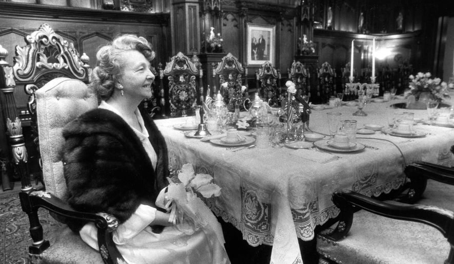 In this May 1, 1988, photo, Mother Divine sits in the dining room of her Woodmont estate in Gladwyn, Pa. Born Edna Rose Ritchings, the widow of Father Divine and leader for decades of a religious movement he founded that advocated racial equality and provided free food to thousands of people has died in Pennsylvania. Mother Divine was believed to be 92. Emil J. Ciavarelli Family Funeral Homes said Mother Divine died Saturday, March 4, 2017, at the movement's Gladwyne estate. (Michael Mercanti/The Philadelphia Inquirer via AP)
