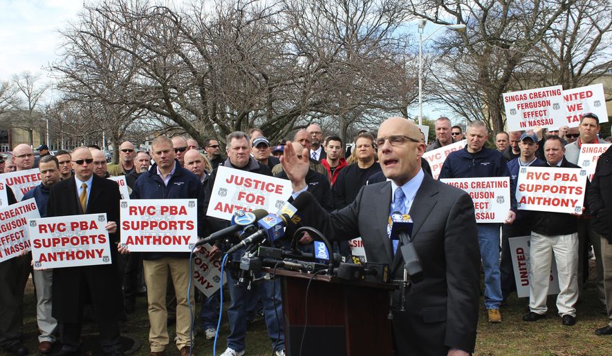 Attorney William Petrillo speaks outside the Nassau County Courthouse in Mineola, N.Y., on Wednesday, March 8, 2017. Petrillo represents Anthony Federico, a village of Rockville Centre police officer who pleaded not guilty to felony assault and other charges stemming from a May 2016 incident in which he allegedly struck a suspect with a stun gun and then falsified paperwork about the case. (AP Photo/Frank Eltman)