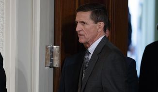 In this Feb. 13, 2017, file photo, Mike Flynn arrives for a news conference in the East Room of the White House in Washington. Flynn, President Donald Trump’s former national security adviser, who was fired from the White House last month, has registered as a foreign agent with the Justice Department for work that may have aided the Turkish government in exchange for $530,000.  (AP Photo/Evan Vucci, File)