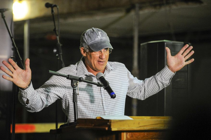 Nashville restaurateur Tom Morales unveils details for his Woolworth on 5th project during a press conference in Nashville, Tenn., Wednesday, March 8, 2017. The site of civil rights sit-ins in 1960, the Woolworth building in downtown Nashville, will reclaim its historic look as it becomes a soul food restaurant with live music. Morales announced the project Wednesday inside the unfinished building at an unveiling. Soulful songs and powerful remarks about the building's history echoed through the largely emptied structure lined with caution tape.(Lacy Atkins/The Tennessean via AP)