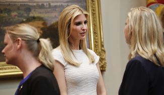 Ivanka Trump, daughter of President Donald Trump speaks with Michelle DeLaune, right, from the National Center for Missing and Exploited Children, during a meeting on domestic and international human trafficking, Thursday, Feb. 23, 2017, in the Roosevelt Room of the White House in Washington. (AP Photo/Pablo Martinez Monsivais)