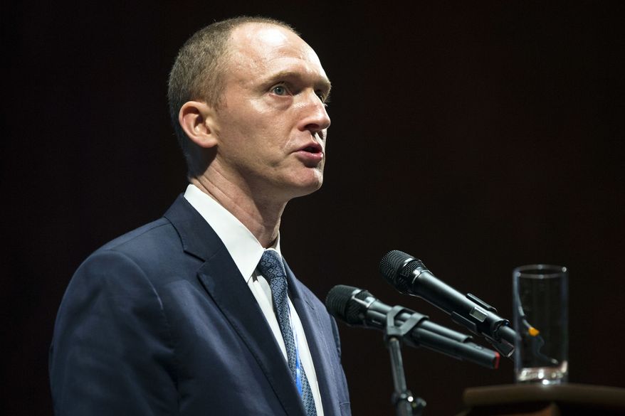 Carter Page, then adviser to U.S. Republican presidential candidate Donald Trump, speaks at the graduation ceremony for the New Economic School in Moscow, Russia, in this Friday, July 8, 2016, file photo. Page, once a little-known investment banker-turned-adviser in the outer circle of the improbable Trump campaign, is emerging as a central figure in the controversy surrounding campaign connections to Russia. (AP Photo/Pavel Golovkin, File)