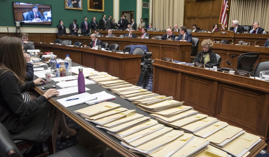 Folders containing amendments to the GOP&#39;s &amp;quot;Obamacare&amp;quot; replacement bill are spread on a conference table on Capitol Hill in Washington, Thursday, March 9, 2017, as members of the House Energy and Commerce Committee worked through the night. (AP Photo/J. Scott Applewhite)
