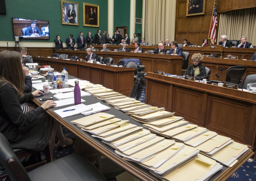 Folders containing amendments to the GOP&#x27;s &amp;quot;Obamacare&amp;quot; replacement bill are spread on a conference table on Capitol Hill in Washington, Thursday, March 9, 2017, as members of the House Energy and Commerce Committee worked through the night. (AP Photo/J. Scott Applewhite)