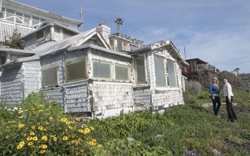 Plans for phase two of Crystal Cove Cottages' next chapter involve refurbishing a row of cottages on the sand. More than a dozen dilapidated cottages at an oceanfront Southern California park will be renovated and made available for overnight rentals under a plan approved by the state Coastal Commission. Commissioners on Wednesday, March 8, 2017, unanimously approved a $30 million development permit to rebuild the wood cottages at Crystal Cove State Park. (Ana Venegas/The Orange County Register via AP)