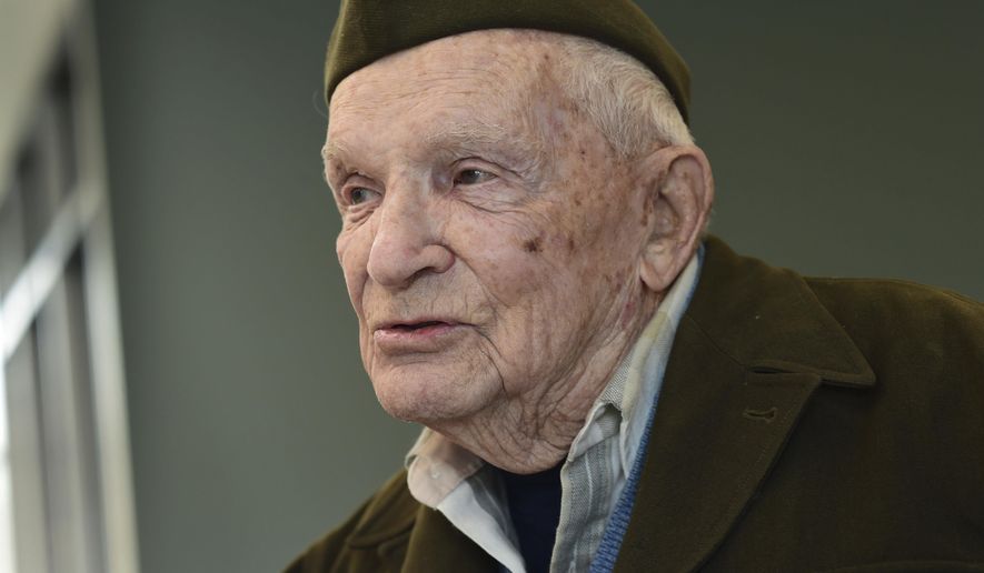 ADVANCE FOR SATURDAY MARCH 11 AND THEREAFTER - In a Monday, Feb. 27, 2017 photo, World War II veteran Jean DeCurtins, 98, is photographed in Stillwater, Minn. At 98, the lifelong Stillwater resident is the last living member of the A&D Last Man's Club, which was formed after veterans from the Stillwater area returned from World War II.He was among the 180 young men who joined the Minnesota National Guard's 135th Infantry and left Stillwater on Feb. 25th, 1941, nine months before Pearl Harbor. (Scott Takushi/Pioneer Press via AP)/Pioneer Press via AP)