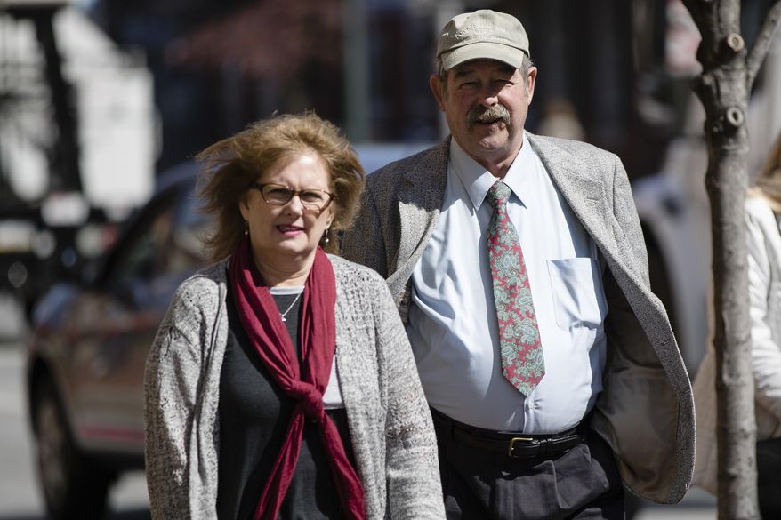 Michael and Deborah Frein, the parents of Eric Frein, walk to the Chester County Justice Center in West Chester, Pa, Thursday, March 9, 2017. Lawyers began the process of picking a jury Thursday in the capital murder trial of Eric Frein charged with killing a Pennsylvania State Police trooper and critically wounding another in a 2014 ambush at their barracks. (AP Photo/Matt Rourke)