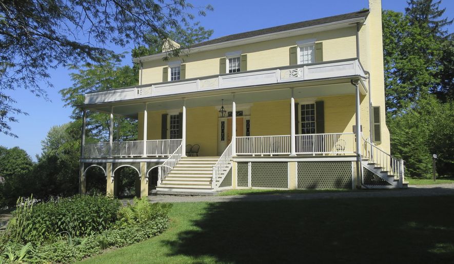 FILE - This Aug. 20, 2016 file photo shows Cedar Grove, the home of artist Thomas Cole, considered the founder of the famous genre of American landscape painting known as the Hudson River School, in Catskill, N.Y. Not only did Cole paint the lush mountain landscapes that inspired the Hudson River School art movement of the 19th century, he also painted on the walls of his home. Pretty decorative patterns on the walls in the parlor of his Catskill home had been buried beneath layers of paint for more than a century before they were discovered a few years ago. (AP Photo/Barbara Woike, File)