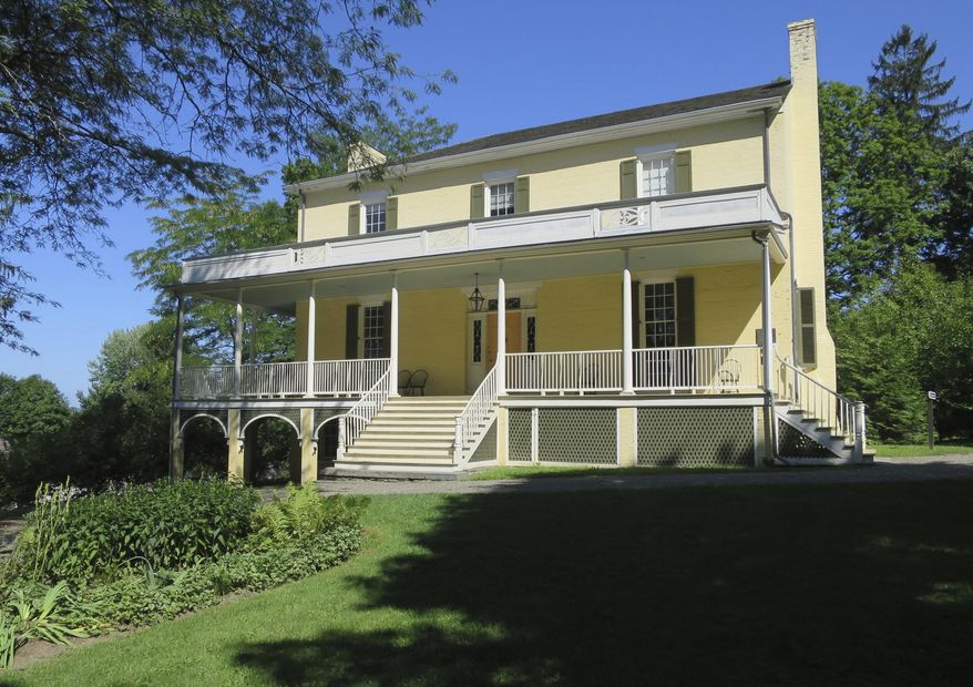 FILE - This Aug. 20, 2016 file photo shows Cedar Grove, the home of artist Thomas Cole, considered the founder of the famous genre of American landscape painting known as the Hudson River School, in Catskill, N.Y. Not only did Cole paint the lush mountain landscapes that inspired the Hudson River School art movement of the 19th century, he also painted on the walls of his home. Pretty decorative patterns on the walls in the parlor of his Catskill home had been buried beneath layers of paint for more than a century before they were discovered a few years ago. (AP Photo/Barbara Woike, File)