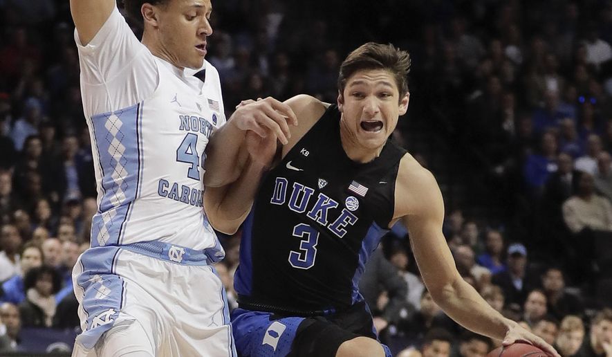 Duke guard Grayson Allen (3) drives against North Carolina forward Justin Jackson (44) in the first half of an NCAA college basketball game during the semifinals of the Atlantic Coast Conference tournament, Friday, March 10, 2017, in New York. (AP Photo/Julie Jacobson)