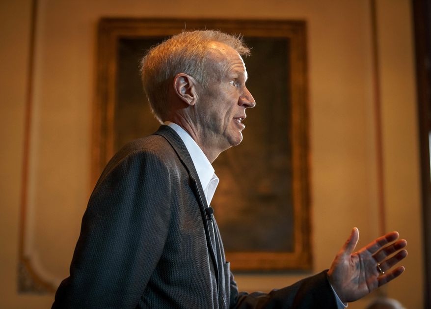 FILE - In this Feb. 23, 2017 file photo, Illinois Gov. Bruce Rauner speaks at a news conference in Springfield, Ill. Gov. Rauner’s office filed paperwork Friday, March 10, 2017, to ensure that his new deputy governor Leslie Munger isn’t paid from an insurance fund that is $4 billion behind on medical payments. The state comptroller received a letter Friday morning from Rauner’s fiscal officer. It requests a portion of Leslie Munger’s $138,000 salary come from a professional services fund. (Justin L. Fowler/The State Journal-Register via AP, File)