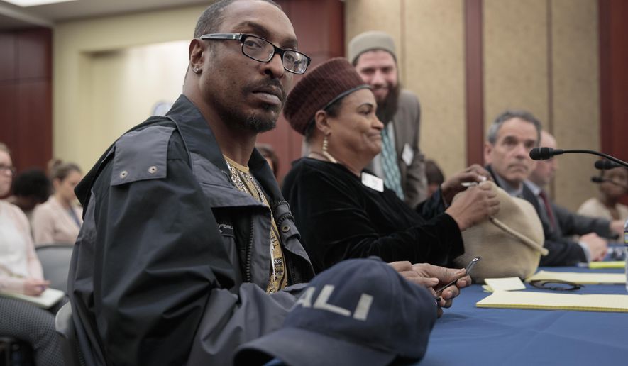 Muhammad Ali Jr., son of the late boxing legend Muhammad Ali, and his mother, Khalilah Camacho-Ali, who was Ali's second wife, attend a forum on Capitol Hill in Washington, Thursday, March 9, 2017, sponsored by House Judiciary Committee members Rep. Zoe Lofgren, D-Calif., and Rep. Luis Gutierrez, D-Ill., a leading advocate in the House for comprehensive immigration reform. (AP Photo/J. Scott Applewhite)