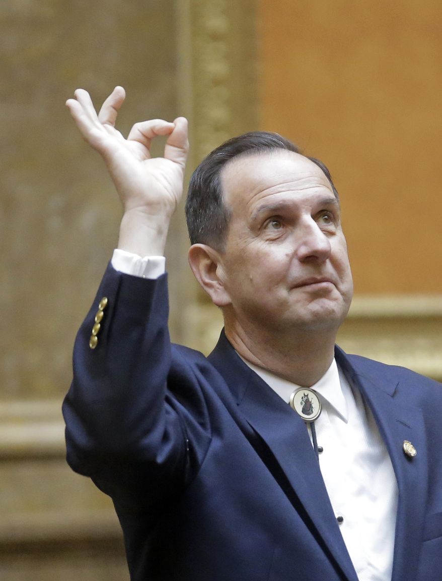 This Feb. 23, 2017, photo, Rep. Norm Thurston, R-Provo, looks on as he stands on he floor of the Utah House of Representatives at the Utah State Capitol, in Salt Lake City. Utah is set to pass the country's toughest DUI threshold despite protests from some legislators that it bolsters the state's reputation as a place that's inhospitable for drinkers. Thurston, said drivers start to become impaired with one drink and the measure will save lives. (AP Photo/Rick Bowmer)