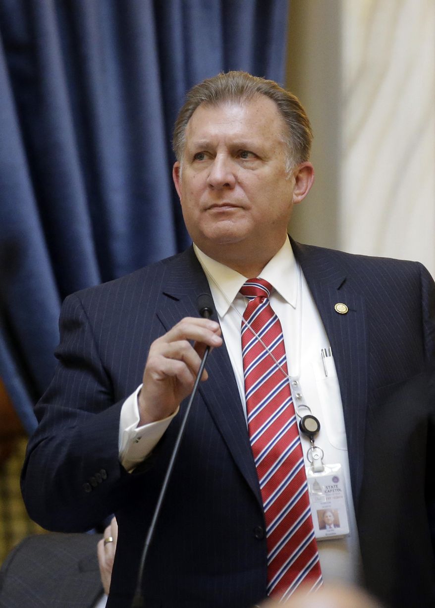 Sen. Curtis Bramble, R-Provo, speaks to the Senate at the Utah state Capitol on Thursday, March 9, 2017, in Salt Lake City. The Senate on Thursday approved a bill requiring doctors to inform women that a medication-induced abortion could be halted after taking just one of two pills, though a doctor's group says there is no conclusive data to back up that claim. Another bill that initially looked to ban doctors using telemedicine to remotely prescribe abortion-inducing drugs has made it through the Legislature after its sponsor removed that ban from the bill. (AP Photo/Rick Bowmer)