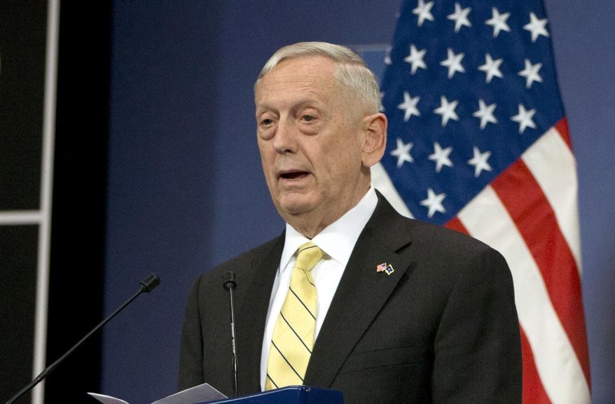 FILE - In this Feb. 16, 2017 file photo, Defense Secretary Jim Mattis speaks in Brussels. Mattis is not lonely in the Pentagon, but two months into his tenure as secretary of defense not a single political appointee has joined him. The retired Marine general, who took office just hours after President Donald Trump was sworn in, has battled the White House over choices for high-priority civilian positions that, while rarely visible to the public, are key to developing and implementing defense policy at home and abroad.  (AP Photo/Virginia Mayo, File)