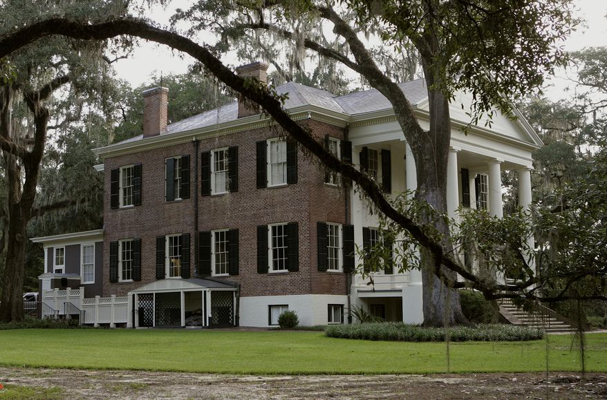 File-This Aug. 29, 2013, file photo shows the Grove, a historical mansion that once belonged to former Florida Gov. LeRoy Collins in Tallahassee, Fla. Calling it a reflection of the "larger American experience," the home that has been witness to slavery, the Civil War and the civil rights era has been opened to the public in Tallahassee. State officials on Saturday, March 11, 2017, swung open the doors to the Grove, a state-owned mansion that was once the residence to Gov. LeRoy Collins. (AP Photo/Steve Cannon, File)