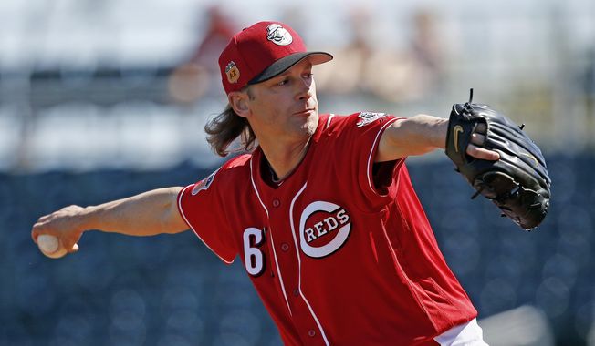 Cincinnati Reds starting pitcher Bronson Arroyo throws against the Milwaukee Brewers during the first inning of a spring training baseball game Sunday, March 12, 2017, in Goodyear, Ariz. (AP Photo/Ross D. Franklin)