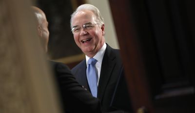 Health and Human Services Secretary Tom Price talks with a guest as they wait for the arrival of Vice President Mike Pence to begin a meeting with conservative groups to discuss healthcare, Friday, March 10, 2017, in the Indian Treaty Room of the Eisenhower Executive Office on the White House complex in Washington. (AP Photo/Pablo Martinez Monsivais)