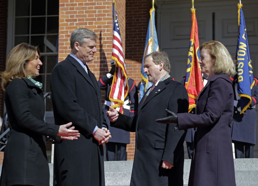 From left, Massachusetts Lt. Governor Karyn Polito and Governor Charlie Baker chat with Irish Taoiseach Enda Kenny and Irish Ambassador to the United States Anne Anderson as they arrive at the Massachusetts Statehouse, Monday, March 13, 2017, in Boston. (AP Photo/Elise Amendola)
