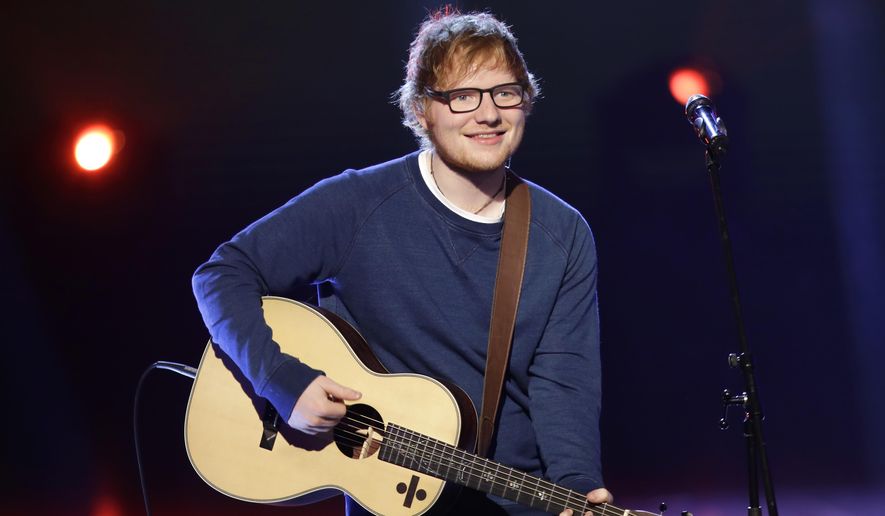 British singer Ed Sheeran performs during the Italian State RAI TV program "Che Tempo che Fa", in Milan, Italy, Sunday, March 12, 2017. (AP Photo/Antonio Calanni)