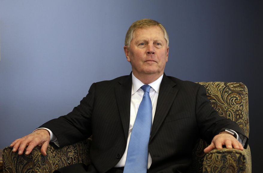 In this Feb. 16, 2017, photo, Everett Mayor Ray Stephanson sits in his office in Everett, Wash. Stephanson is suing pharmaceutical giant Purdue Pharma, becoming the first city trying to hold the maker of OxyContin accountable for damages to his community. (AP Photo/Elaine Thompson)