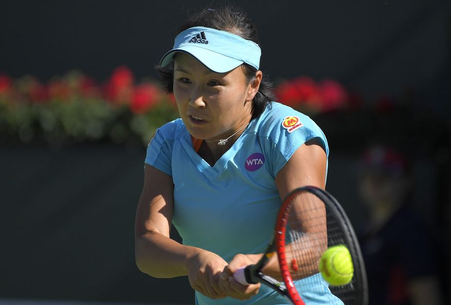 Peng Shuai, of China, returns a shot to Venus Williams at the BNP Paribas Open tennis tournament, Tuesday, March 14, 2017, in Indian Wells, Calif. (AP Photo/Mark J. Terrill)