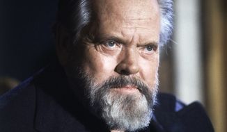 FILE - This Feb. 22, 1982 file photo shows actor and movie director Orson Welles during a press conference in Paris. Netflix has acquired the global rights to Welles’ “The Other Side of the Wind” and will finance its completion and restoration. Netflix’s announcement Tuesday, March 14, 2017, brought to a close the decades-long mystery surrounding one cinema’s greatest filmmakers. (AP Photo/Jacques Langevin, File)